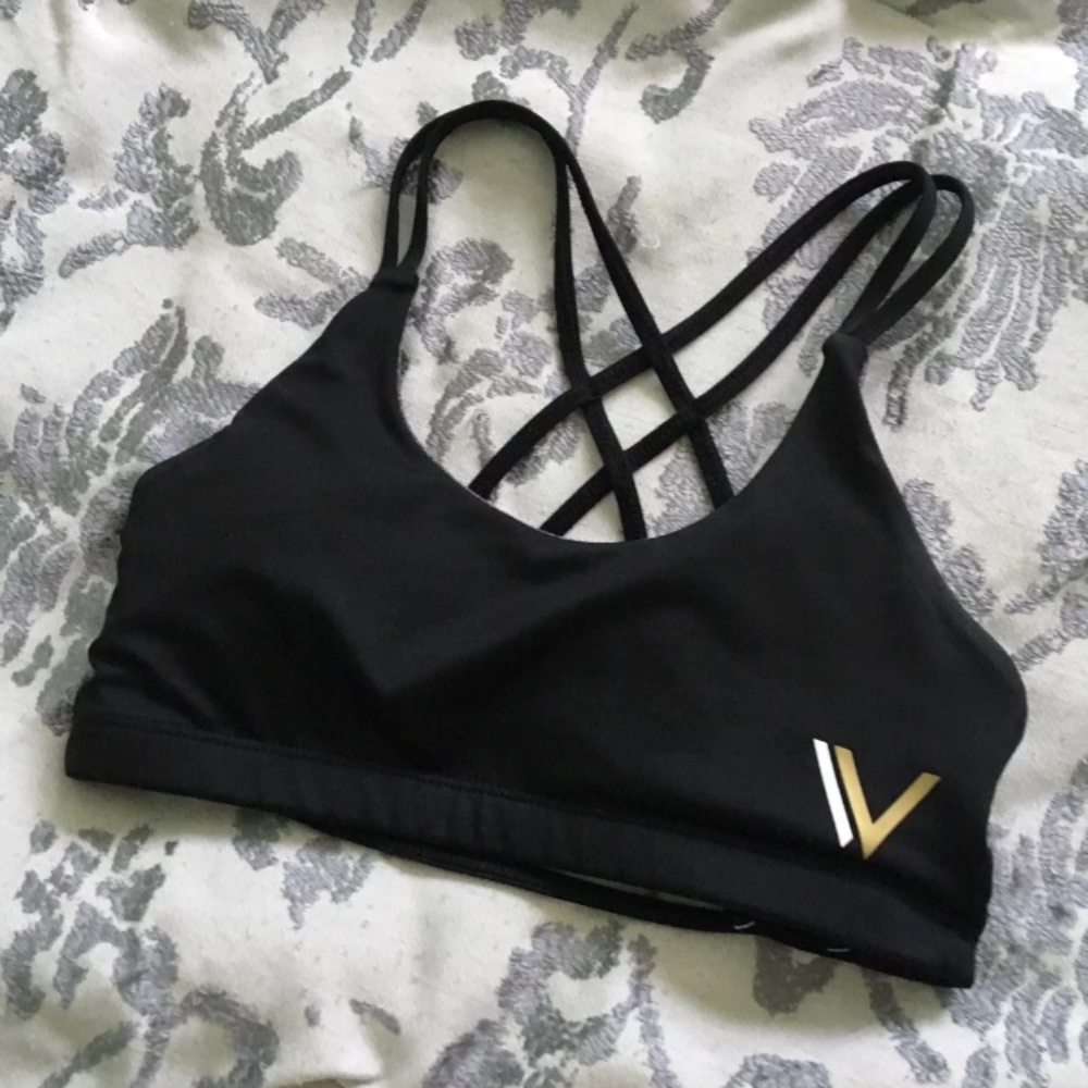 BLACK CAGED BACK VULLSPORT SPORTS BRA. MEDIUM.